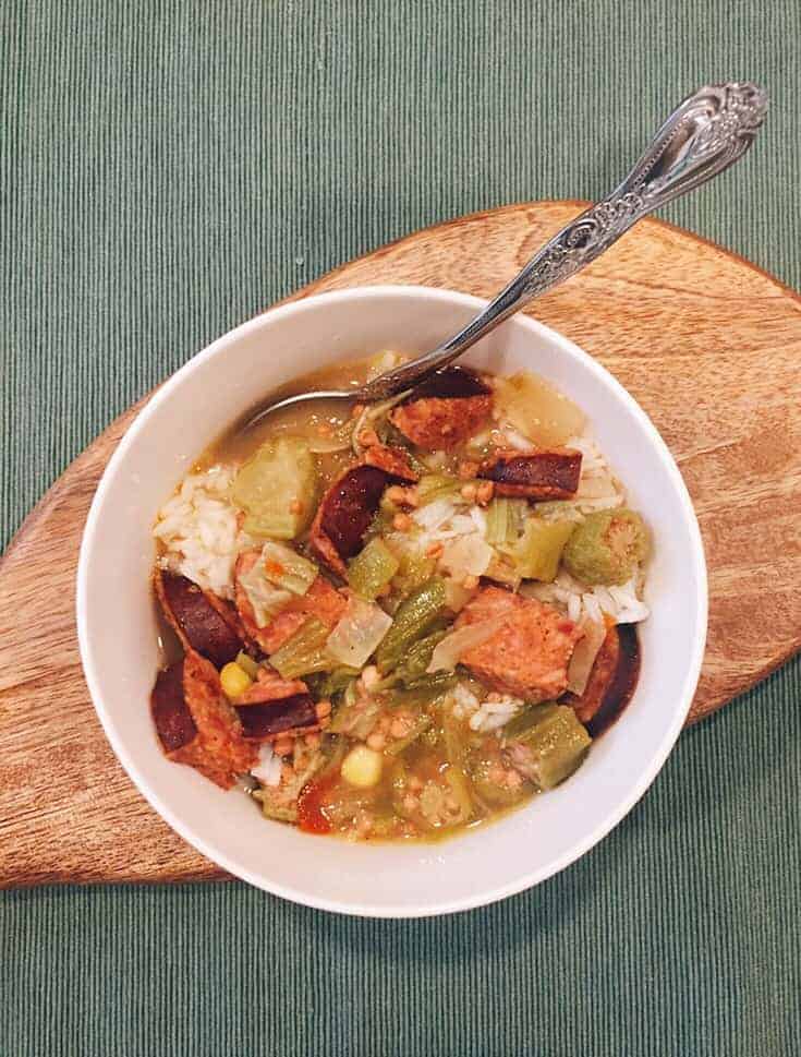 no roux gumbo in a bowl on a wooden board