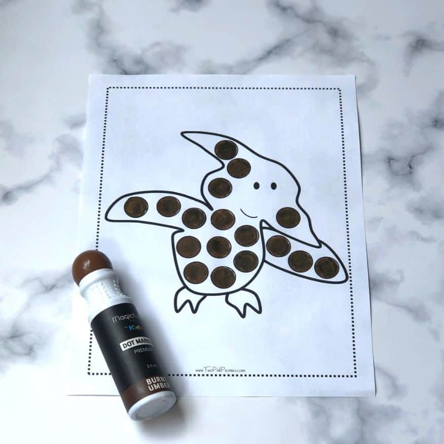 Dinosaur Dot Marker Page with a brown dot marker.