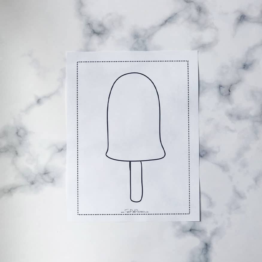 Blank popsicle template on a marble background. 