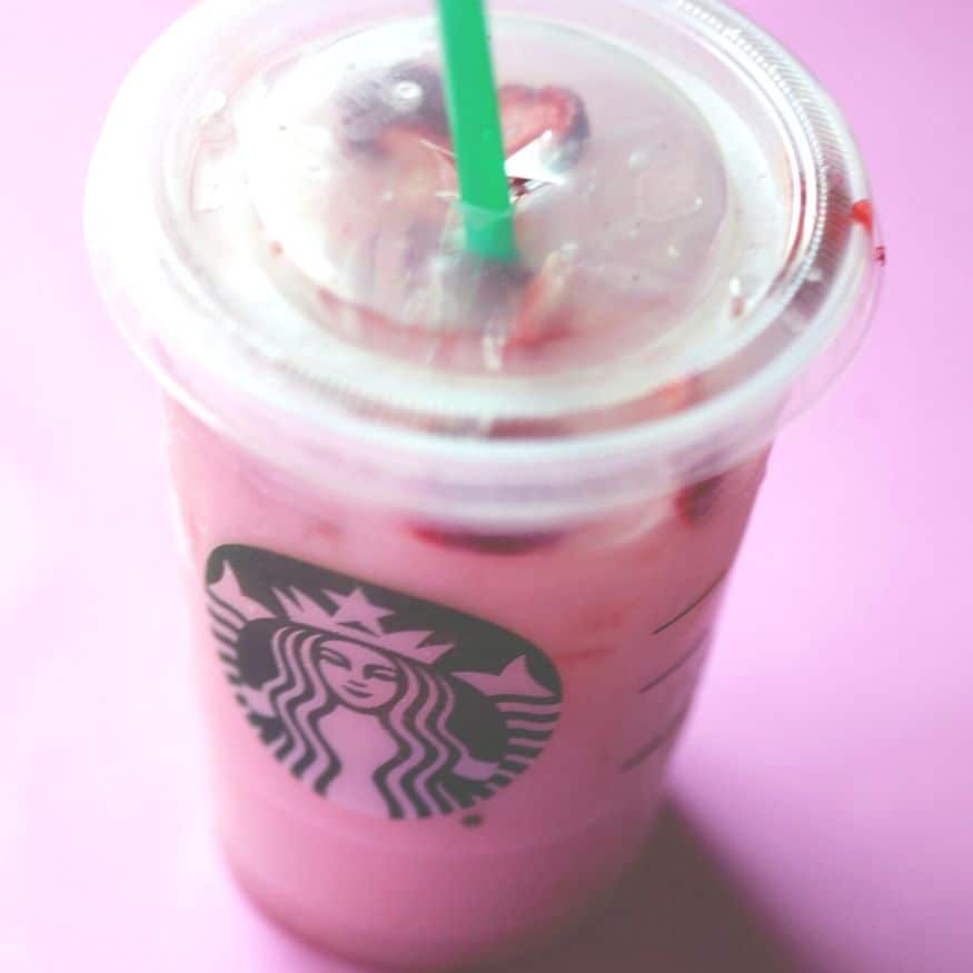 A pink Starbucks cold drink. 