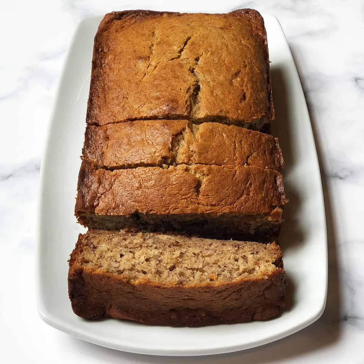 loaf of Amish banana bread on a plate